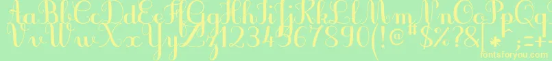 フォントJbcursiveV3Bold – 黄色の文字が緑の背景にあります