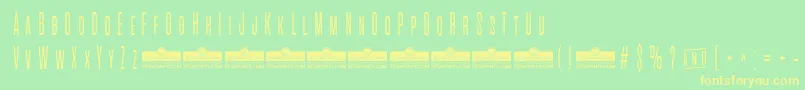 AlienscowsExtralightTrial Font – Yellow Fonts on Green Background