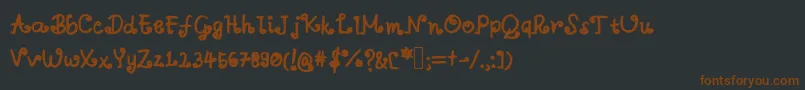 Шрифт Aswirlvelvet – коричневые шрифты на чёрном фоне
