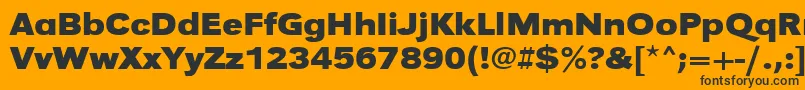 Czcionka UrwgrotesktextwidBold – czarne czcionki na pomarańczowym tle