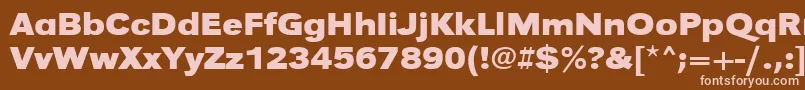 UrwgrotesktextwidBold-fontti – vaaleanpunaiset fontit ruskealla taustalla