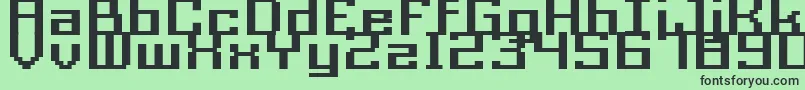 GrixelAcme9RegularBoldXtnd Font – Black Fonts on Green Background