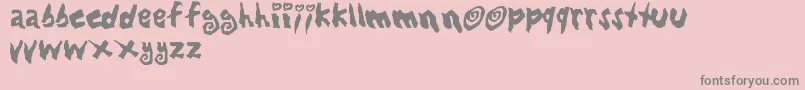 Lovbabe-fontti – harmaat kirjasimet vaaleanpunaisella taustalla