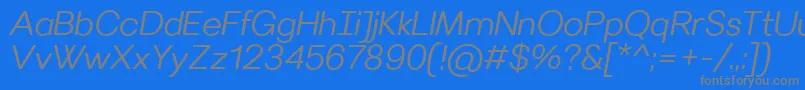 Czcionka VillerayroundedSemilightitalic – szare czcionki na niebieskim tle