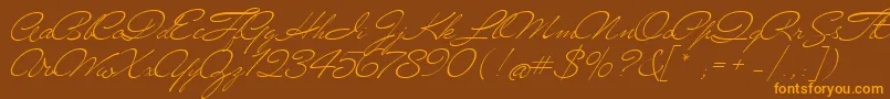 Mrblaketon Font – Orange Fonts on Brown Background