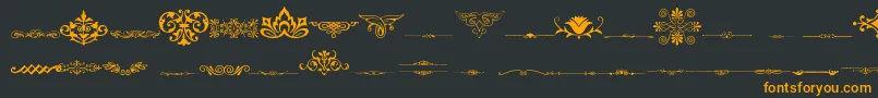 Шрифт VintageDecorativeSigns3 – оранжевые шрифты на чёрном фоне