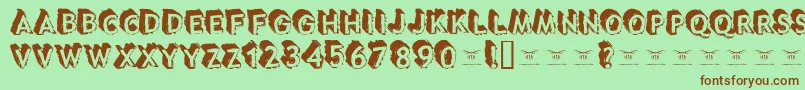 Tacotruckmilitia Font – Brown Fonts on Green Background