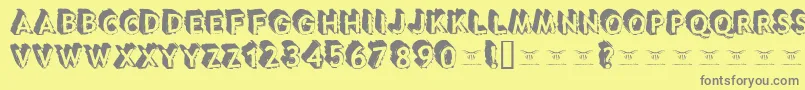 Tacotruckmilitia Font – Gray Fonts on Yellow Background