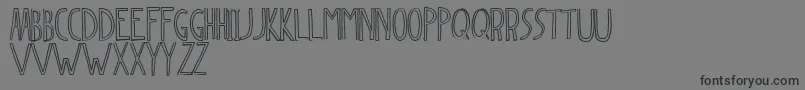 Dingleberry-Schriftart – Schwarze Schriften auf grauem Hintergrund