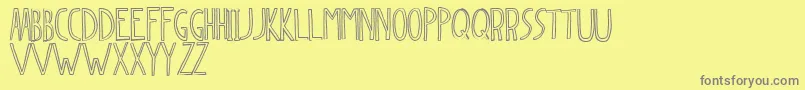 Dingleberry Font – Gray Fonts on Yellow Background