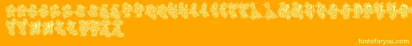 Vtksbeauty-Schriftart – Gelbe Schriften auf orangefarbenem Hintergrund