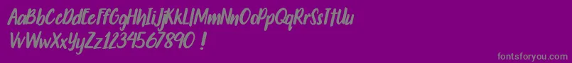 Travelgoals-Schriftart – Graue Schriften auf violettem Hintergrund
