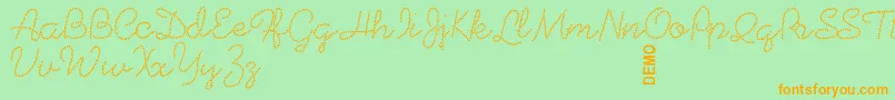 Czcionka Beadworkdemo – pomarańczowe czcionki na zielonym tle