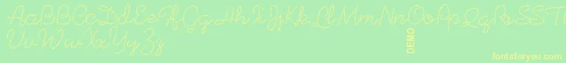 Beadworkdemo-Schriftart – Gelbe Schriften auf grünem Hintergrund