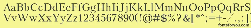 Kudrashovc Font – Black Fonts on Yellow Background