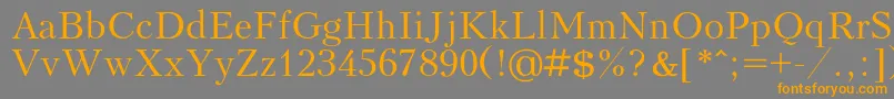 フォントKudrashovc – オレンジの文字は灰色の背景にあります。