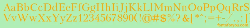 Kudrashovc Font – Orange Fonts on Green Background