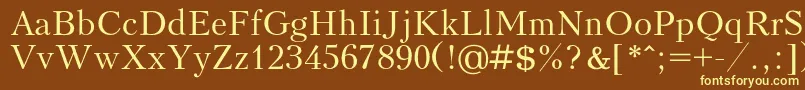 Kudrashovc Font – Yellow Fonts on Brown Background