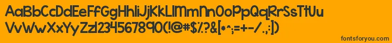 Kgwhattheteacherwants Font – Black Fonts on Orange Background