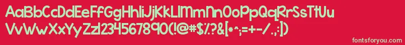 Kgwhattheteacherwants-Schriftart – Grüne Schriften auf rotem Hintergrund