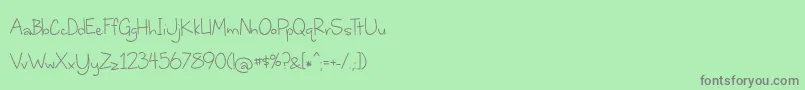 WhereStarsShineTheBrightest-Schriftart – Graue Schriften auf grünem Hintergrund
