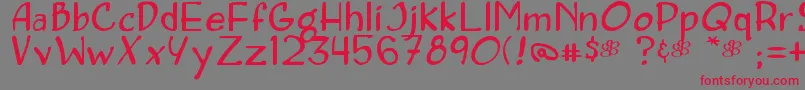 Concetta-Schriftart – Rote Schriften auf grauem Hintergrund