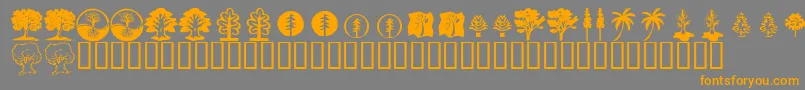 フォントKrTrees – オレンジの文字は灰色の背景にあります。
