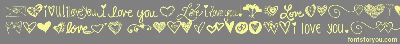 フォントKg Heart Doodles – 黄色のフォント、灰色の背景