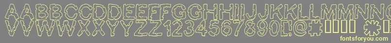 Bite ffy Font – Yellow Fonts on Gray Background