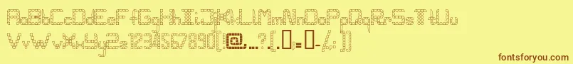 フォントPangho – 茶色の文字が黄色の背景にあります。