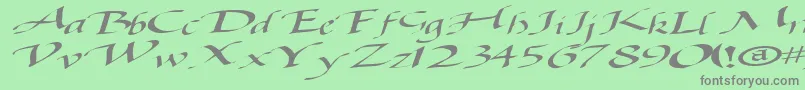 フォントBaggagemastertext79RegularTtext – 緑の背景に灰色の文字