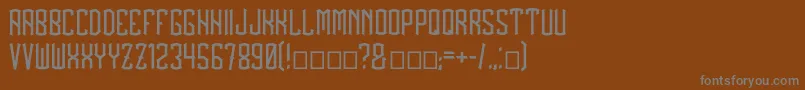 BlackDrops Font – Gray Fonts on Brown Background