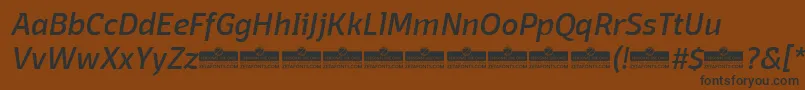 Шрифт DomotikaItalicTrial – чёрные шрифты на коричневом фоне