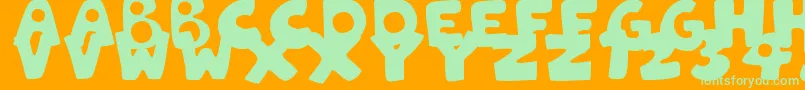 Police PatchworkStitchlingsColor – polices vertes sur fond orange