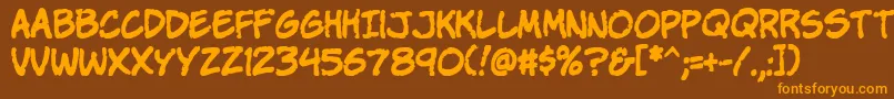 Komikap Font – Orange Fonts on Brown Background
