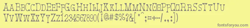 フォントDeborahCondensed – 黄色の背景に灰色の文字