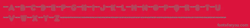 フォントFtAcidtestRegressive – 赤い背景に灰色の文字