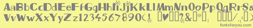 Beam-fontti – harmaat kirjasimet keltaisella taustalla