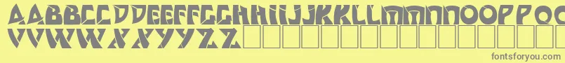 Fonte DsComedyCyrBold – fontes cinzas em um fundo amarelo