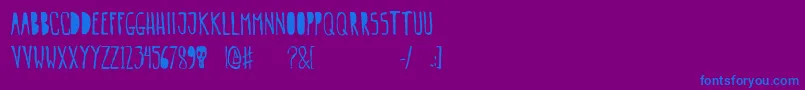 Gogozombie Font – Blue Fonts on Purple Background