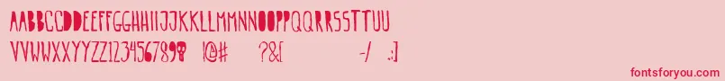 Gogozombie-Schriftart – Rote Schriften auf rosa Hintergrund