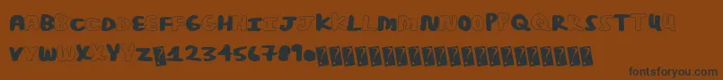 Więcej informacji o czcionce Posterbold Czcionka Posterbold – czarne czcionki na brązowym tle