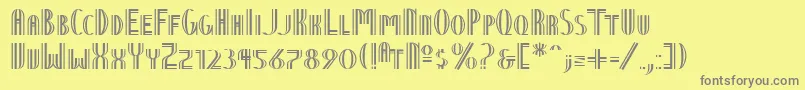 NineteenTenVienna-fontti – harmaat kirjasimet keltaisella taustalla