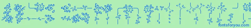Czcionka AuriolVignette – niebieskie czcionki na zielonym tle