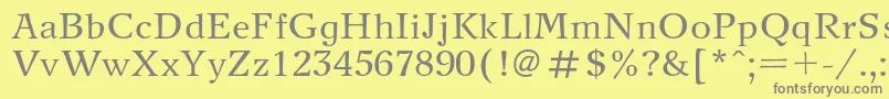 フォントNewjournalc – 黄色の背景に灰色の文字