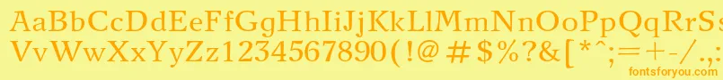 フォントNewjournalc – オレンジの文字が黄色の背景にあります。