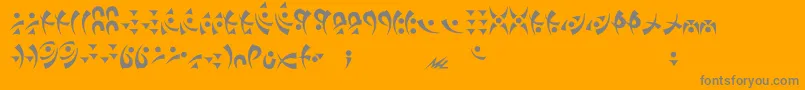 Takcha-Schriftart – Graue Schriften auf orangefarbenem Hintergrund