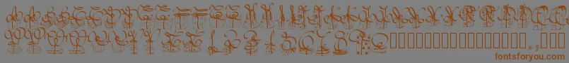 Шрифт Pwchristmasgifts – коричневые шрифты на сером фоне
