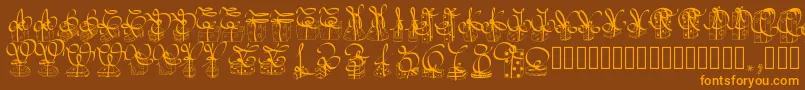 Pwchristmasgifts-fontti – oranssit fontit ruskealla taustalla