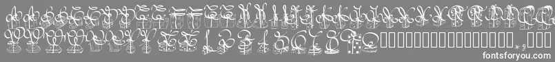 フォントPwchristmasgifts – 灰色の背景に白い文字